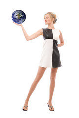 Fototapeta premium businesswoman with globe (globe from nasa.gov)
