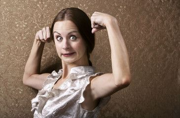 Young Woman Flexing Her Biceps
