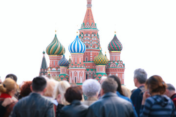 tourists look at st.Basil cathedral