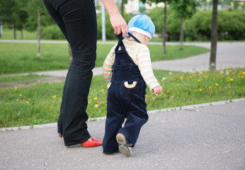 Mother helps child to go