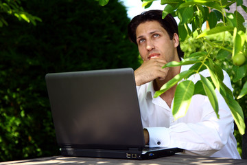 business man in green garden