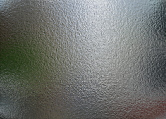Metal foil, mat wrinkled glass or abstract chrome texture