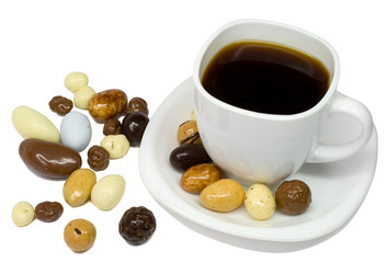white coffee cup with candies