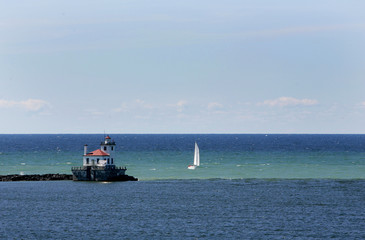 lighthouse and boat