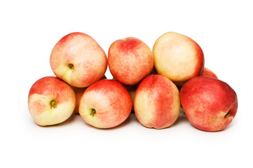 Many nectarines isolated on the white background