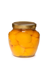 Jar with peaches isolated on the white