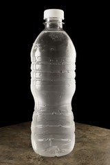 Refreshing cold water in a bottle.