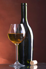 Still-life wine bottles and glass