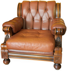 Old wood and leader armchair with woodcarvings