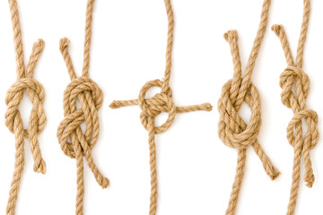 Four pieces of rope fastened in four different knots