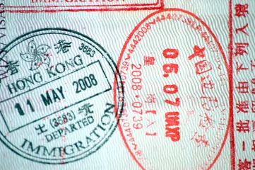 Selbstklebende Fototapeten Passport stamps from Hongkong and China borders © BartekMagierowski