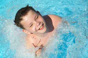 boy studies to float