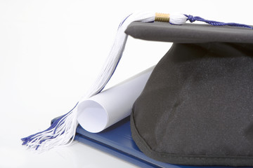 graduation cap and diploma