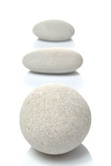 Three white pebbles