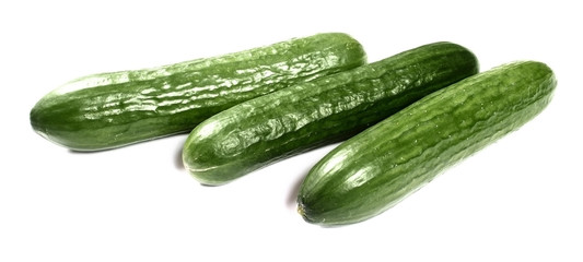 Fresh cucumbers on white