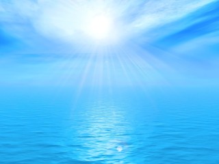 blue sky and sun reflected in water