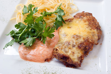 Chop on Milan with paste and sauce