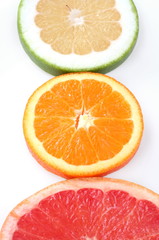 Three slice fresh citrus isolated on white background