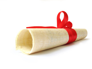 papyrus document with bow of red ribbon