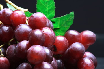 Glowing blue grapes close-up