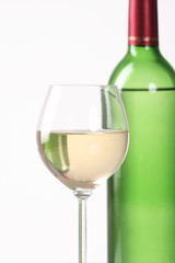 Bottle and glass of  wine  on white background