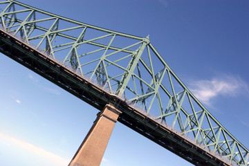 Steel bridge and stone pillar