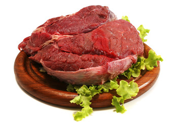 beef meat and salad over white on plate