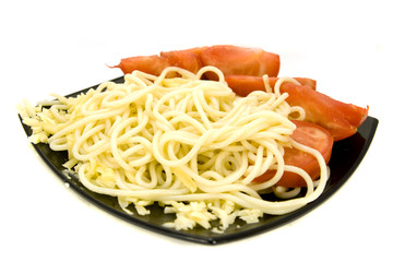 macaroni on plate with tomatoes