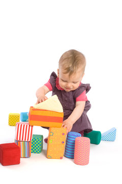 Baby palying with toy blocks