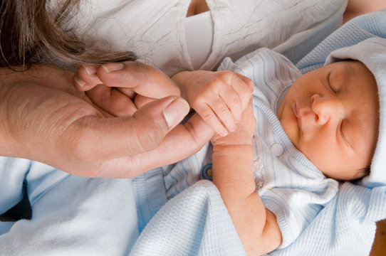baby's grasping hand