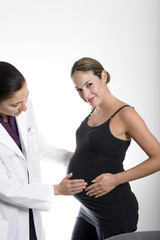 pregnant woman and her doctor