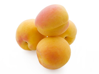 pile of fresh apricots isolated on white