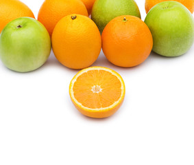 Apple and oranges isolated on the white