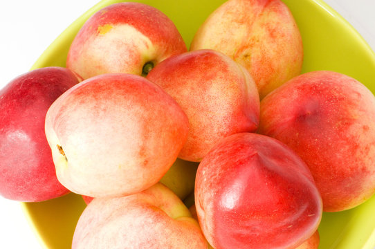 Healthy eating concept - close up of nectarines