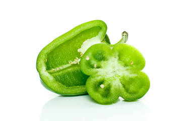 Half of green sweet pepper and flower-shaped slice