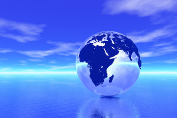 Naklejka premium Globe in ocean