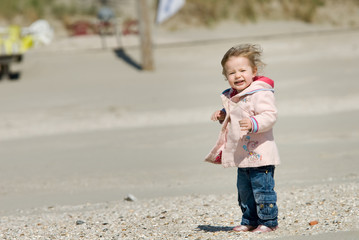 cute young girl on the beach