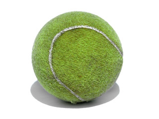 Dirty used tennis ball isolated against a white background
