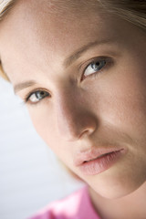 Head shot of woman thinking