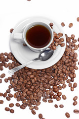 Cup with coffee, costing on coffee grain