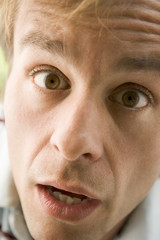 Head shot of surprised man