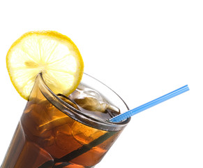 glass of cola with lemon and straw