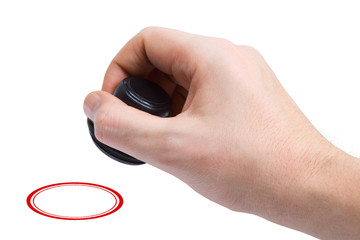 Hand with stamp - copy-space in printout