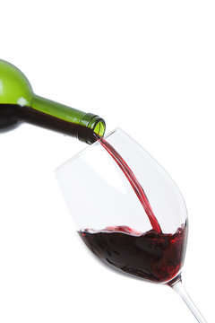 Pouring Red Wine Into Large Wine Glass