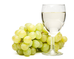 Wine in a glass and grapes