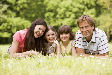 Fototapeta premium Family outdoors smiling