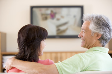 Fototapeta premium Couple watching television smiling