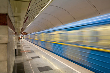 Fast train with motion blur in a subway