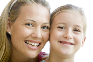 Woman and young girl smiling