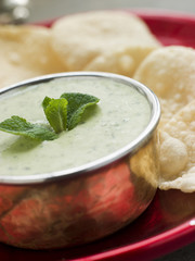 Fresh Green Yoghurt Chutney with mini Papadoms